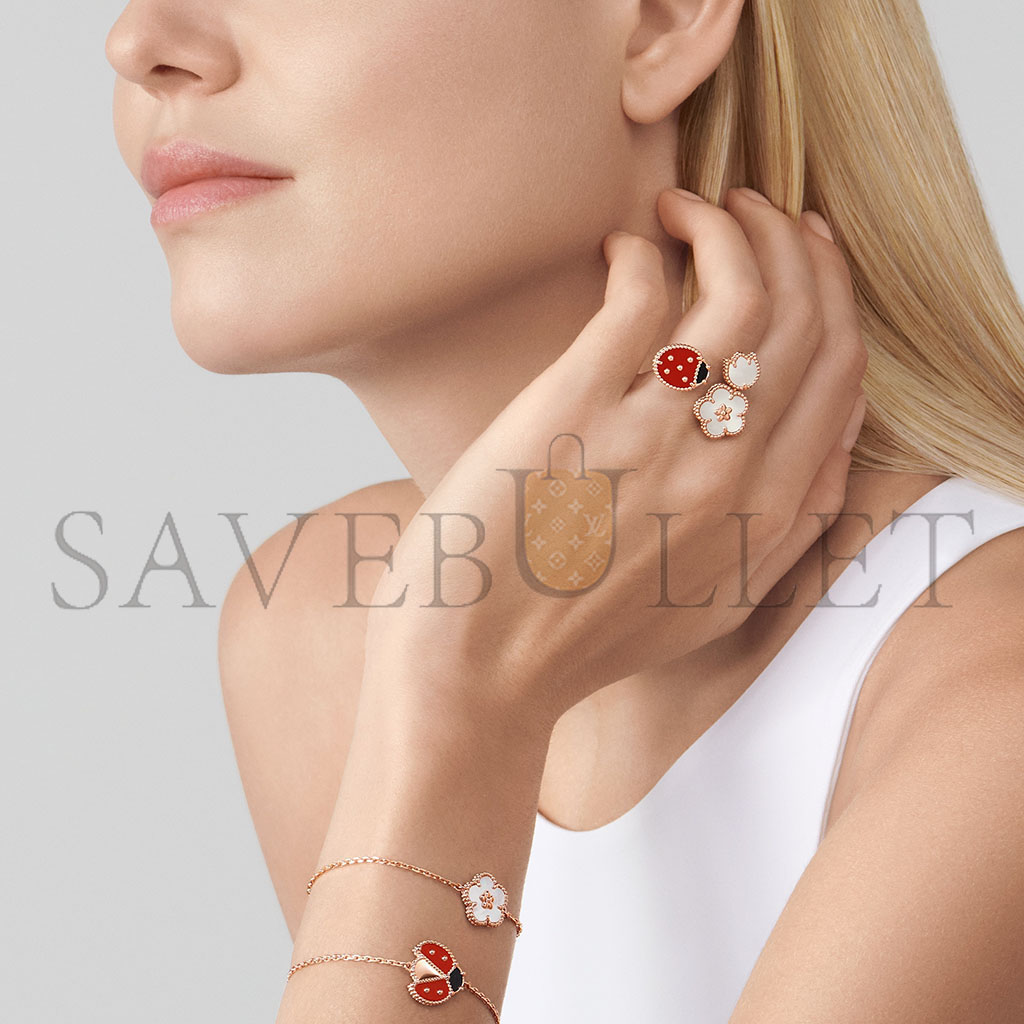 V*N CL*F arpels lucky spring between the finger ring vcarp9x300